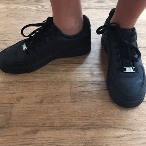 Black low top Nike Air Force 1